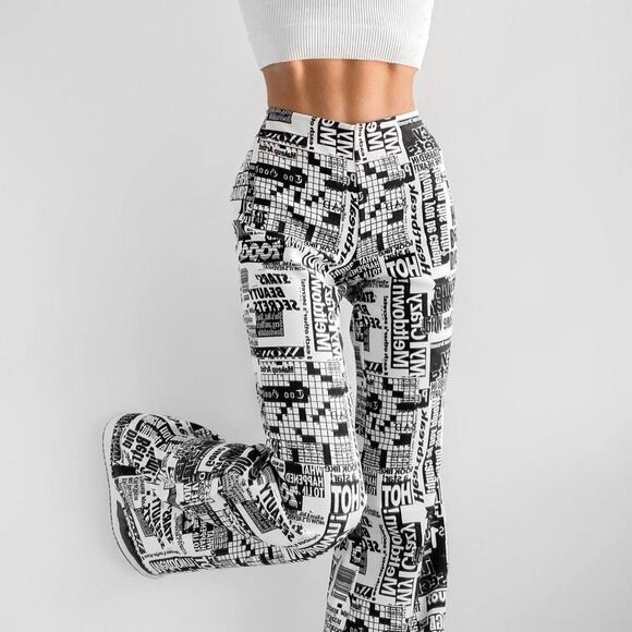 Urban Outfitters Newspaper Print Flared Pants Size Medium - Picture 1 of 9